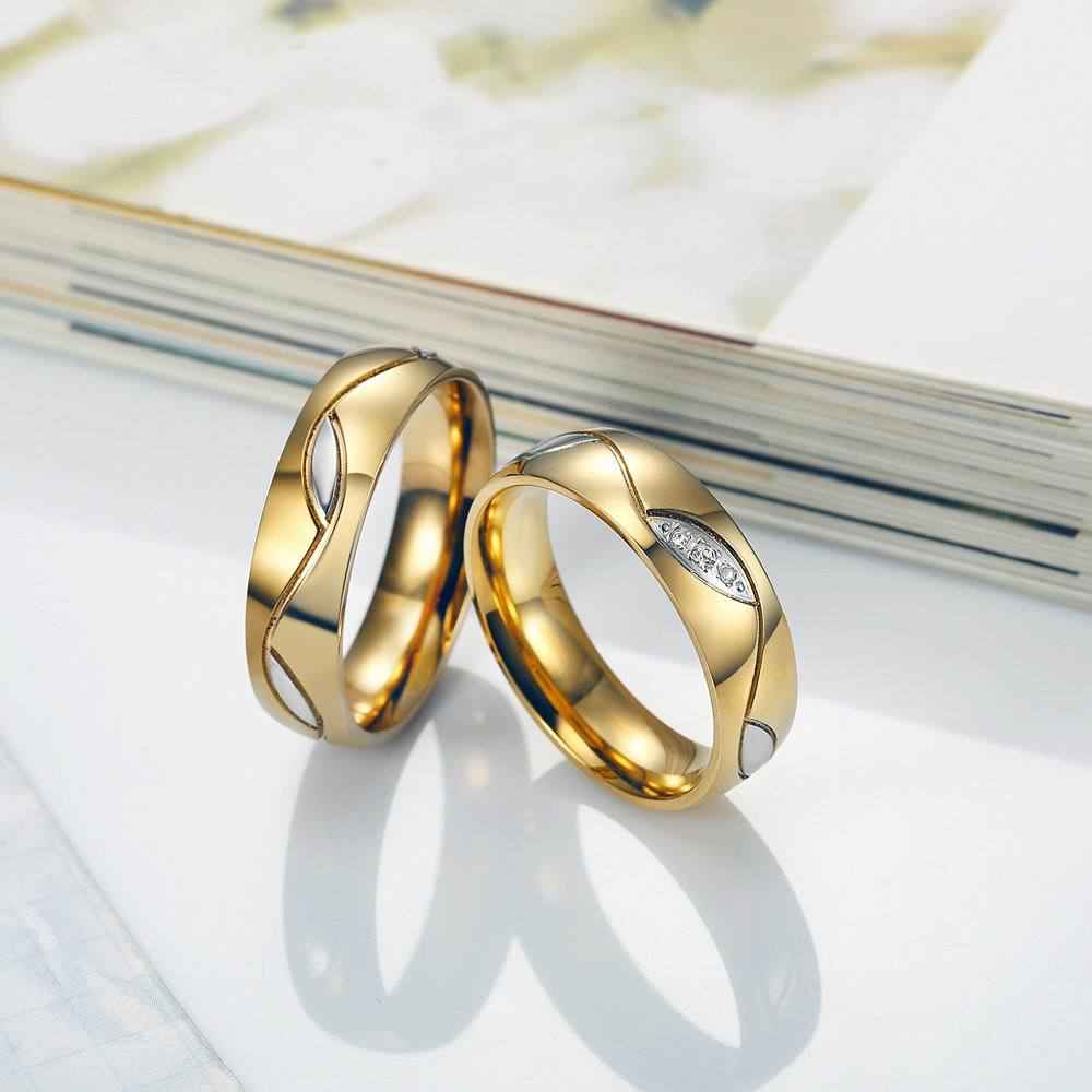 Couple Interlocking Gold Rings with Diamonds