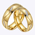 Couple Interlocking Gold Rings with Diamonds